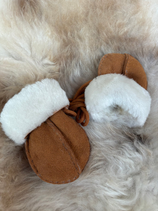 100% children’s sheepskin mittens on a string